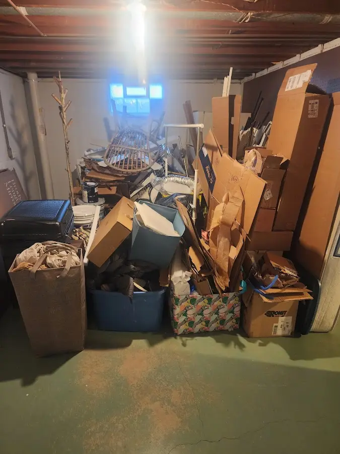 Roll-off dumpster container at job site for 2 Yard Dumpster Rental in Addison